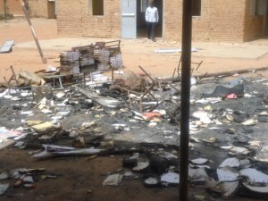 Ashes outside the church where the contents of all buildings were burned